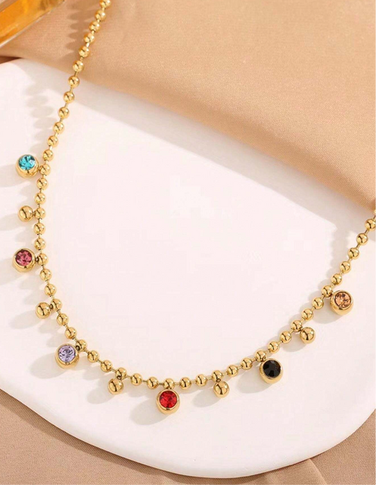 Collar con bolitas de colores